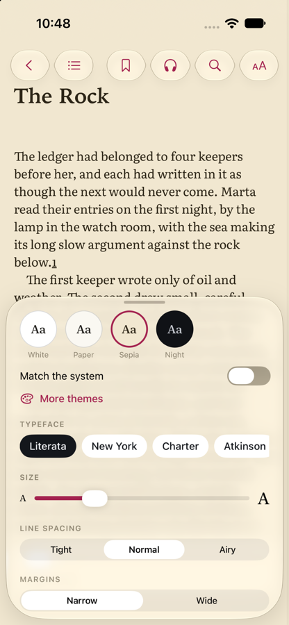 The Aa sheet over a page: themes, type faces and sizes, all changing on the page behind.