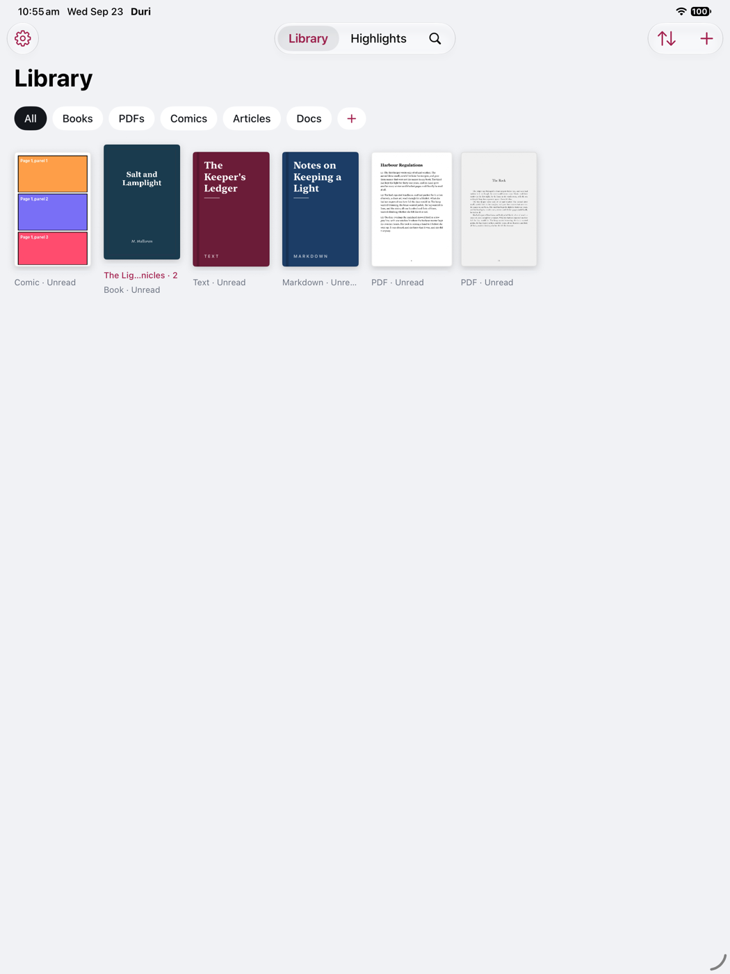 Duri's library on an iPad, covers in a wide grid.